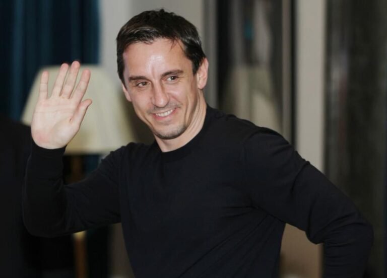 Gary Neville, former footballer and pundit, with a successful career in sports and business.