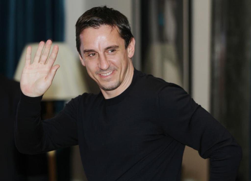 Gary Neville, former footballer and pundit, with a successful career in sports and business.