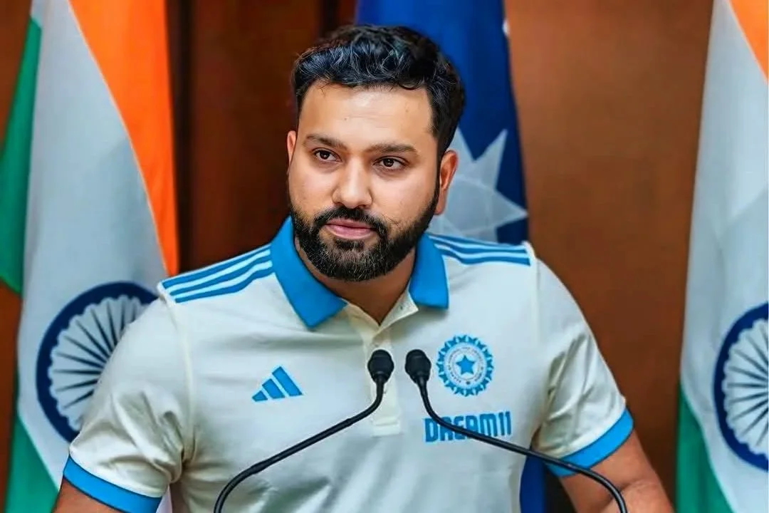 Rohit Sharma posing with cricket bat during an ODI match